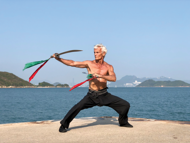 Finding Balance in the Journey of Hung Gar: Sifu Gam on Overcoming Adversity & Integrating Eastern and Western Approaches to Health in Master of Mastery